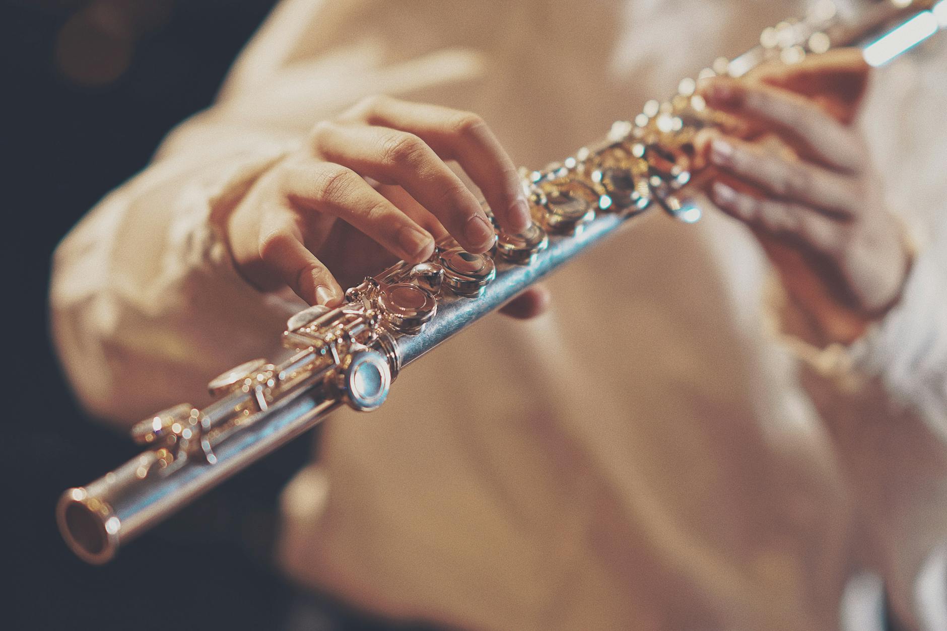 person playing wind instrument