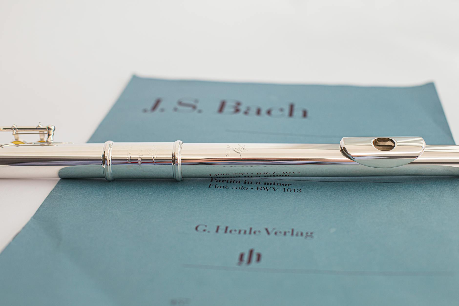 a flute on a sheet music