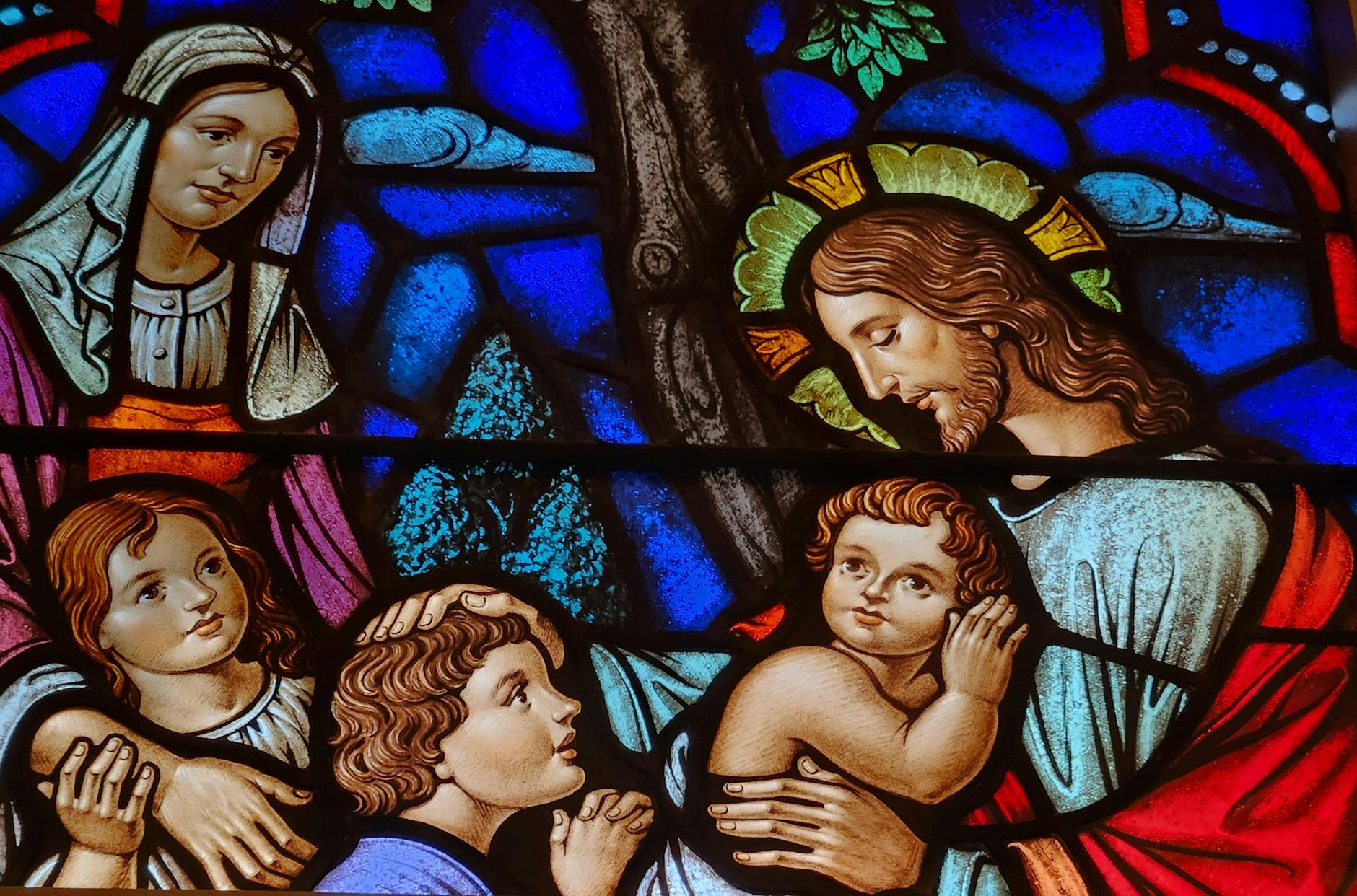 stained glass window with religious theme